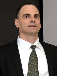 写真1：米RSA SecurityのRSA Fraud & Risk IntelligenceでGeneral Manager of FraudAction BusinessとDirectorを務めるAlon Shmilovitz（アロン・シミロヴィッツ）氏