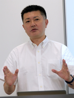 写真1:日本IBM IBMクラウド事業本部 テクニカル・セールス エクゼクティブ・テクニカル・スペシャリスト 樽澤広亨氏