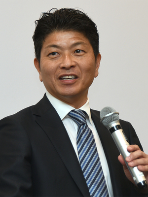 写真1：SAPジャパン 常務執行役員ゼネラルビジネス統括本部統括本部長の牛田勉氏